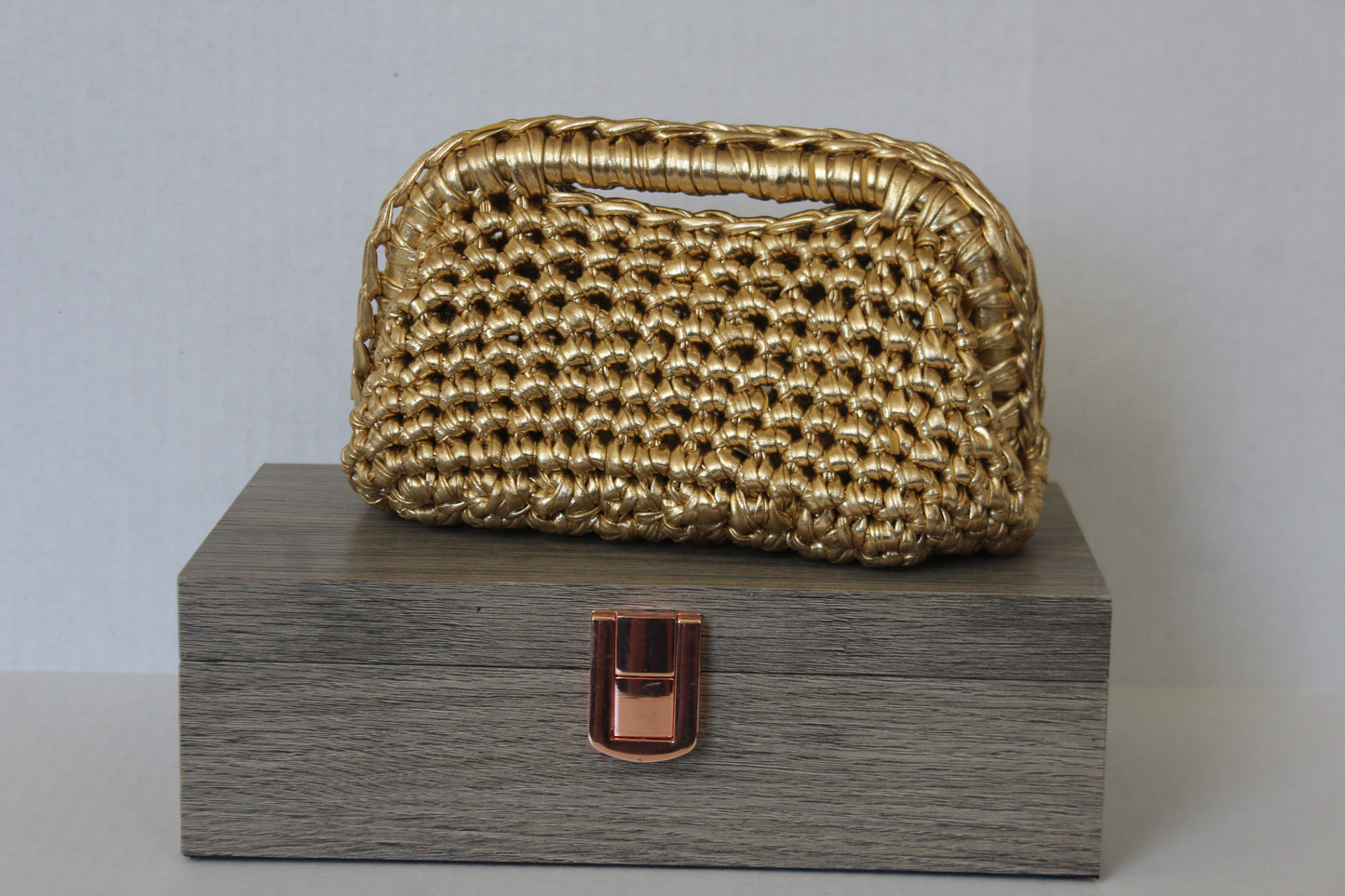 Gold clutch